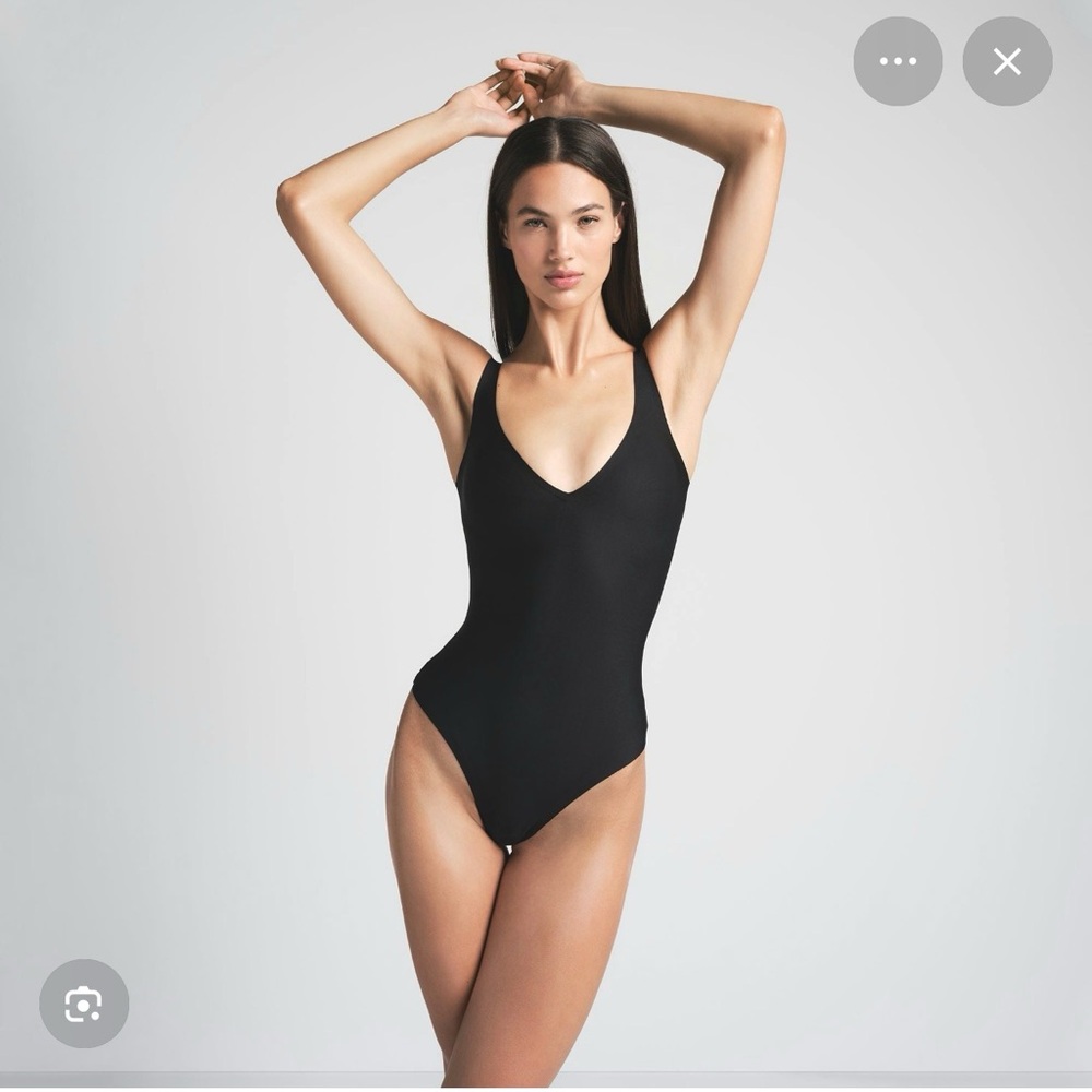 SKIMS body unlined plunge thong bodysuit - ONYX